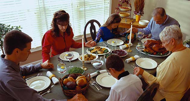 Family Praying Before Dinner ca. 2001